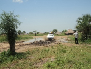 Hard-top cars struggling to reach Bor from Juba as the highway continues to deteriorate in Panwel in Bor county, Jonglei state. August 4, 2011 (ST)