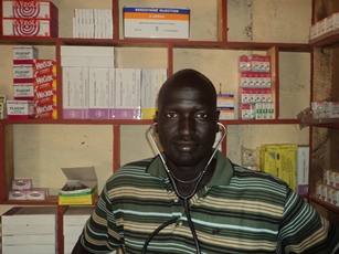 William Chieng Dador a pharmacist in Rubkotna county open his pharmacy after passing state checks, 25, August 2011 (ST)