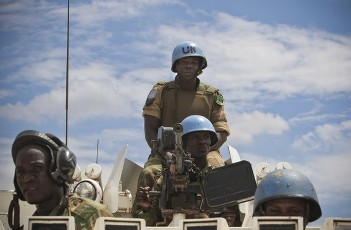 FILE - Zambian soldiers serving as part of the Force Reserve Battalion with the United Nations Mission in Sudan (UNMIS) stand together as they prepare to depart on a patrol in Abyei town May 25, 2011 (Reuters)