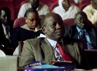 File - Dr. Lam Akol, head of the Sudan Peoples Liberation Movement, Democratic Change, listens in on a discussion of southern unity and cooperation, during an all-southern-parties meeting in Juba, southern Sudan, Wednesday, Oct. 13, 2010 (AP)
