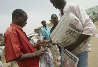 A newspaper vendor in Sudan's capital Khartoum (AFP)