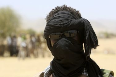 A rebel soldier stands guard during the visit of Joint Special Representative (JSR) Ibrahim Gambari to Fanga Suk village in East Jebel Marra, West Darfur.  (Reuters)