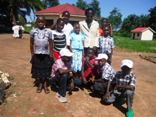 Abductees in with state minister of social development, Norma Fadul and other UN Agencies before departure to DRC (ST)