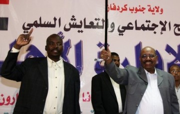 South Kordofan governor Ahmad Haroun (L) and Sudan President Omer Al-Bashir (R)