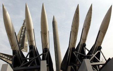 Models of a North Korean Scud-B missile (C) and South Korean Hawk surface-to-air missiles are seen at the Korean War Memorial Museum in Seoul February 17, 2011 (Reuters)
