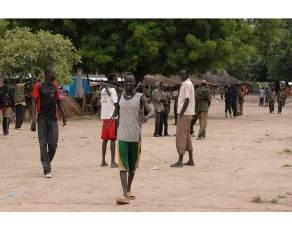 Soldiers and armed civilians mix in the market,  Jonglei state (Allvoices)