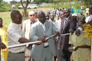 Dr. Emmnuel Ijja Central Equatoria state Minister of Health cuts the tape to officially open the new office in Central Equatoria's Morobo County. October 7, 2010 (ST)