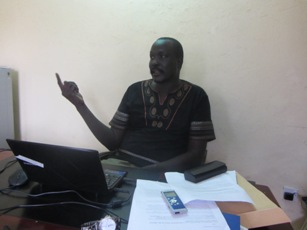 Nhial Bol, editor in chief of The Citizen newspaper, narrates his arrest and detention during an interview with Sudan Tribune on 30 September in his Juba office. (Photo: Ngor Garang/ST)