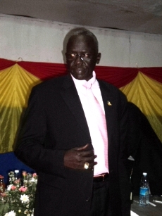 South Sudan minister of roads and bridges, Gier Chuang Aluong prepares to give certificates of merits to students in Kampala on Saturday Nov. 5, 2011 (ST)
