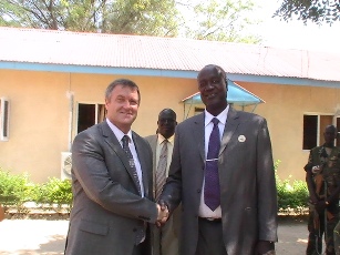 British ambassador to South Sudan, Alastair Mcphail (left) with Jonglei governor Kuol Manyang Juuk (right) near the conference hall in Bor, Jonglei, South Sudan, November 23, 2011 (ST)
