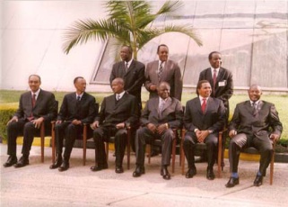 The three heads of the East African Community partner states ( Kenya , Uganda and Tanzania ), in a group picture with the presidents of Rwanda and Burundi during the 7th summit meeting of the EAC at the Centre in December 2006 (AICC website)