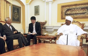 FILE - Sudan President Al Bashir meets Chinese Special Envoy to Sudan, Liu Guijin during his official visit to Khartoum June 11, 2011 (Reuters)