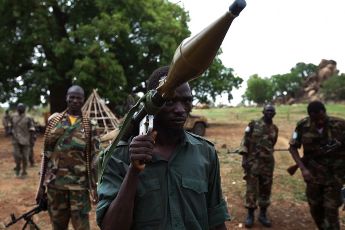 Rebels from the Sudan People's Liberation Army-North (SPLA-North) near Dalami, South Kordofan province, show off a rocket propelled grenade launcher they captured in a recent battle with the northern Sudan Armed Forces (Trevor Snapp - GlobalPost)