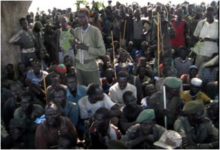 Lou Nuer youth listen to VP Riek Machar at Linkuangole on Wednesday Dec. 28, 2011