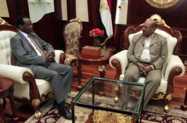 President Omer al-Bashir (R) holds a meeting with Tijani el-Sissi, , after el-Sissi's swearing-in as chairperson of Darfur Regional Authority October 23, 2011. (Reuters)