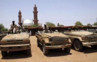 Sudanese security forces display vehicles they captured from rebels following the rebel attack on Khartoum on May 15, 2008 (AP)