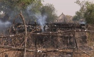 A burning tukul (hut) in Pibor, South Sudan (UN)