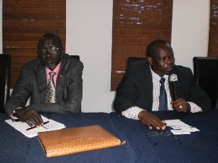 South Sudan's petroleum minister, Stephen Dhien Dau (L) and Pagan Amum addressing representative of oil companies in Juba. Dec. 18, 2011 (ST)