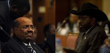 Sudanese president Omer Hassan al-Bashir (L) & South Sudan president Salva Kiir (R) attend talks in the Ethiopian capital Addis Ababa January 27, 2012 (AFP)