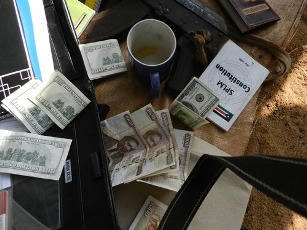 The fake currencies allegedly recovered after MP Bol's house was searched in Aweil on December 20, 2011 (Police photos)