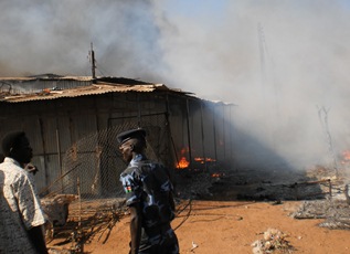 South Sudanese police assisting at the fire at Rubkotna market, Unity state, South Sudan, January 25, 2011 (ST)