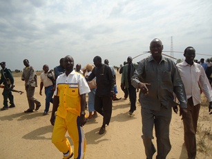 Goverment and UN officials received by Duk commissioner (in yellow) at Padiet airstrip, Padiet, Duk, Jonglei, South Sudan, January 18, 2012 (ST)