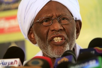 Islamic opposition leader Hassan al-Turabi of the Popular Congress Party speaks during a news conference at the party headquarters in Khartoum January 5, 2011 (Reuters)