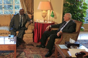 Arab League secretary general Nabil al-Arabi (R) meets with veteran Sudanese military intelligence officer General Mohammed Ahmed Mustafa al-Dabi, head of the Arab League observer mission in Syria, in Cairo on December 24, 2011 (AFP)