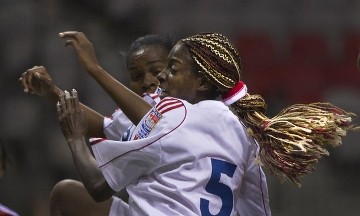 Yoanis Linares Reyes of Cuba's multi-coloured hair flies during the second half of their CONCACAF Women's Olympic qualifying soccer match against Haiti in Vancouver, British Columbia January 23, 2012 (Reuters)