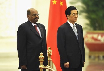 President of Sudan Omer Hassan al-Bashir and Chinese President Hu Jintao listen to the national anthems during a welcoming ceremony at the Great Hall of the People on June 29, 2011 in Beijing, China (AFP)