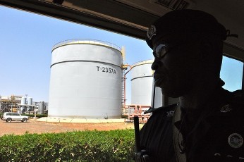 A policeman patrols around the Petrodar oil concession during a shutdown on oil production by South Sudan, on January 29, 2012 (AFP)