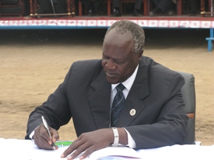 Governor Kuol Manyang Juuk signs the State Transitional Constitution in Bor's Freedom Square. 25 February 2012 (ST)