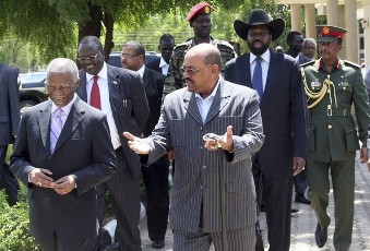 Sudan's President Omer Hassan al-Bashir (C) walks out with former South African President Thabo Mbeki (L) and South Sudan’s President Salva Kiir Mayardit (2nd R) (Reuters)
