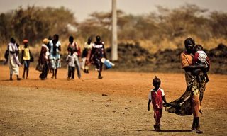 Abyei's civil population fleeing from aerial bombardment (AFP/Getty)