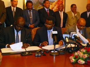 Pagan Amum (left), chief negotiator from South Sudan, lead mediator for the African Union, Piere Buyoya (centre) and Sudan’s head negotiator Idriss Abdel-Gader, attend the end of African Union-led talks between Sudan and South Sudan in Addis Ababa on March 13, 2012 (AFP)