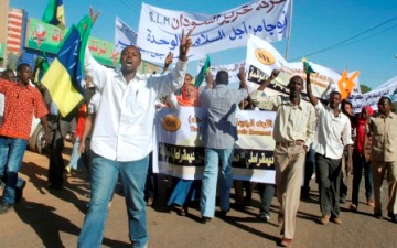 File-2010 photo of a protest outside the Sudanese parliament against the National Security Forces Act (REUTERS)