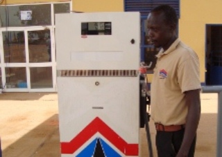 A fuel attendant in Juba, South Sudan (ST/File photo)