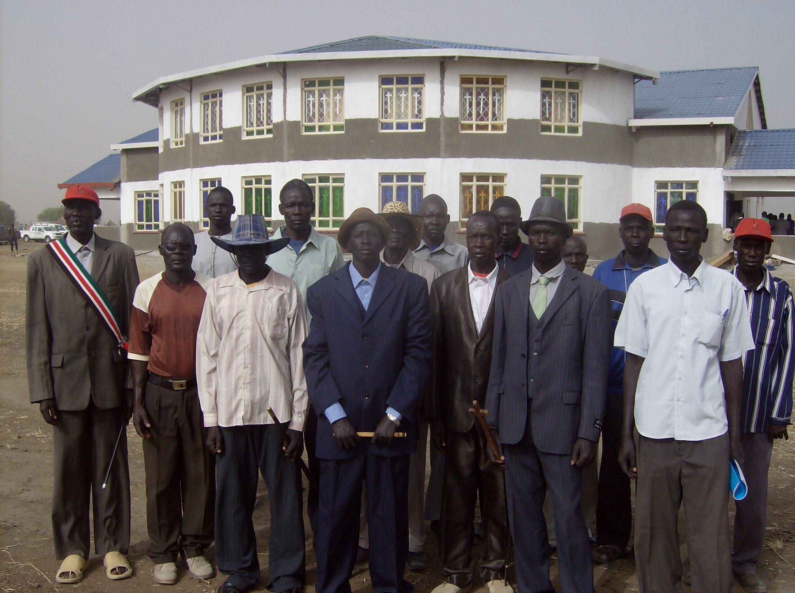 Group of chiefs standing in front of the church at Makol Cuei village in Jonglei State, South Sudan. March 19, 2012 (ST)