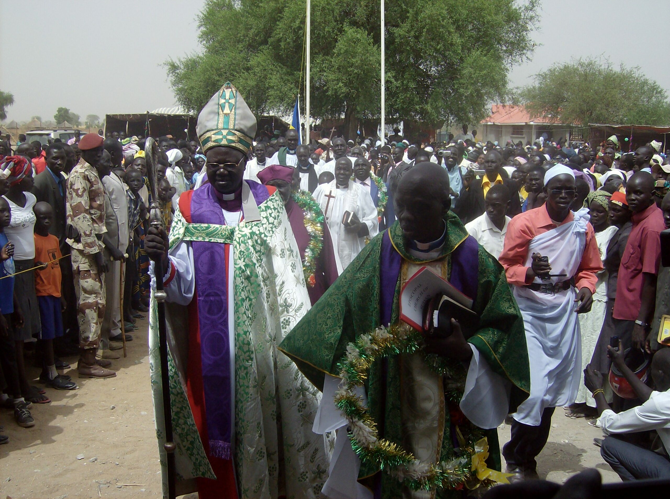 Bor Diocese Bishop, Ruben Akurdit Ngong, leading Christians into the new Church at Makol Cuei village in Jonglei State, South Sudan. March 19, 2012  (ST)
