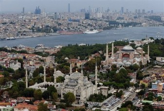 Two landmarks, Sultan Ahmed Mosque, left, and Hagia Sophia, seen with the Bosporus, in Istanbul, Turkey September 2011 (AP)