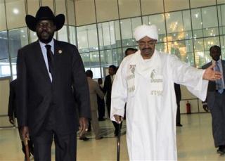 Sudan's president, Omar al-Bashir and South Sudan's Salva Kiir, Khartoum airport, October 2011 (reuters)