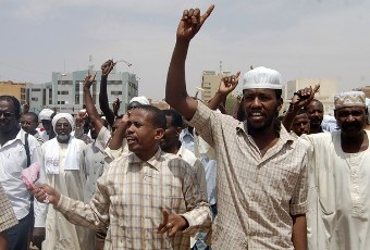 Men demonstrate against the United Nations' decision to extend the United Nations/African Union Mission's mandate in Darfur (UNAMID) in Sudan, after taking part in Jumma prayers (Friday prayers) in Khartoum August 19, 2011 (Reuters)