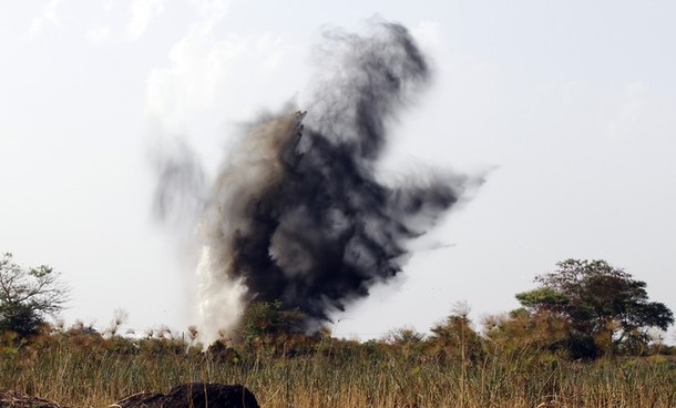 Smoke rises after the Sudanese air force fired a missile during an air strike in Rubkona near Bentiu April 23, 2012) Reuters/Goran Tomasevic)