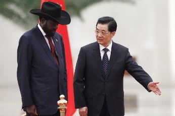 China's President Hu Jintao (R) gestures to his South Sudanese counterpart Salva Kiir Mayardit during an official welcoming ceremony at the Great Hall of the People in Beijing April 24, 2012 (Reuters/Petar Kujundzic)
