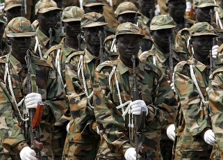 FILE - Sudan People's Liberation Army (SPLA) soldiers hold rifles during a rehearsal of the Independence Day ceremony in Juba July 7, 2011 (Reuters)