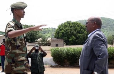 al-Bashir inspects the guard of honour during his first visit to Kadogli capital of South Kordofan State August 23, 2011. (Reuters)