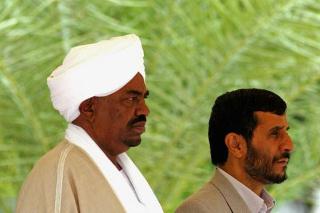 Iran's President Mahmoud Ahmadinejad (R) and Sudanese President Omar al-Bashir, April 26, 2006 (UPI)