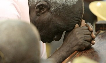 FILE - A man prays during Easter Sunday service at Episcopal Church of the Sudan Diocese of Khartoum All Saints Cathedral in Khartoum April 24, 2011 (Reuters)