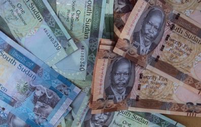 A picture shows  notes of the new South Sudan pound, which pictures the late South Sudanese independence leader John Garang, in Juba on July 18, 2011. (Getty)