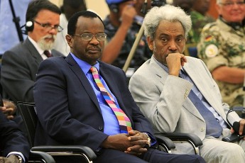 FILE PHOTO – Head of Darfur regional Authority, Tijani el-Sissi, (L) and head of Darfur follow-up office Amin Hassan Omar (R) (REUTERS)